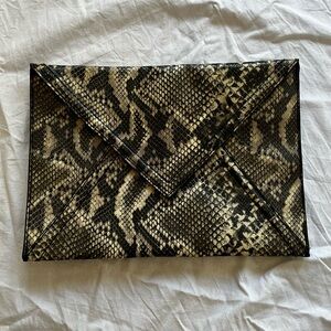Snake skin clutch